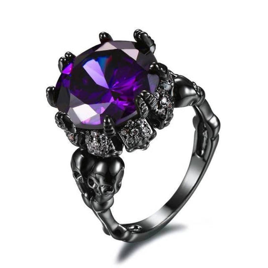 Bague gothique pour femme en acier avec crânes et diamant violet