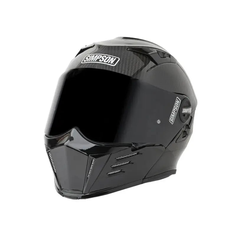 Casque moto modulable carbone Simpson Darksome, visière transparente et écran solaire intégré.
