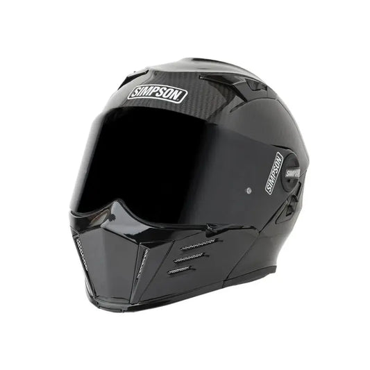 Casque moto modulable carbone Simpson Darksome, visière transparente et écran solaire intégré.
